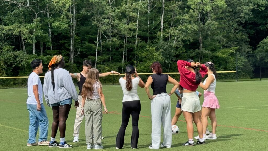 Students on a field. 